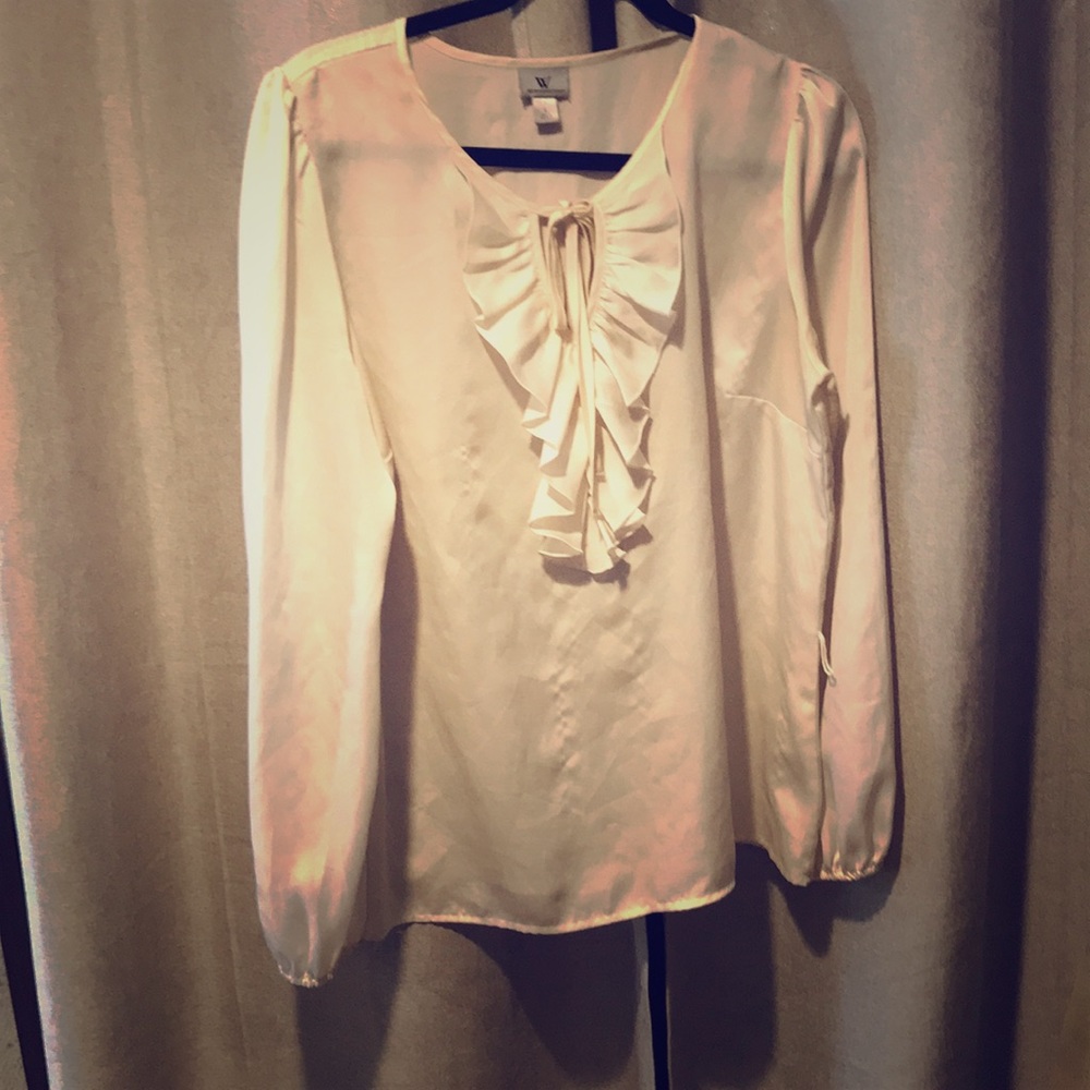 White ruffled blouse